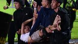 Soccer tragedy: More than 100 killed in post-game stampede in Indonesia