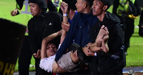 Soccer tragedy: More than 100 killed in post-game stampede in Indonesia