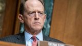 GOP Sen. Toomey warns banks against getting involved in social issues