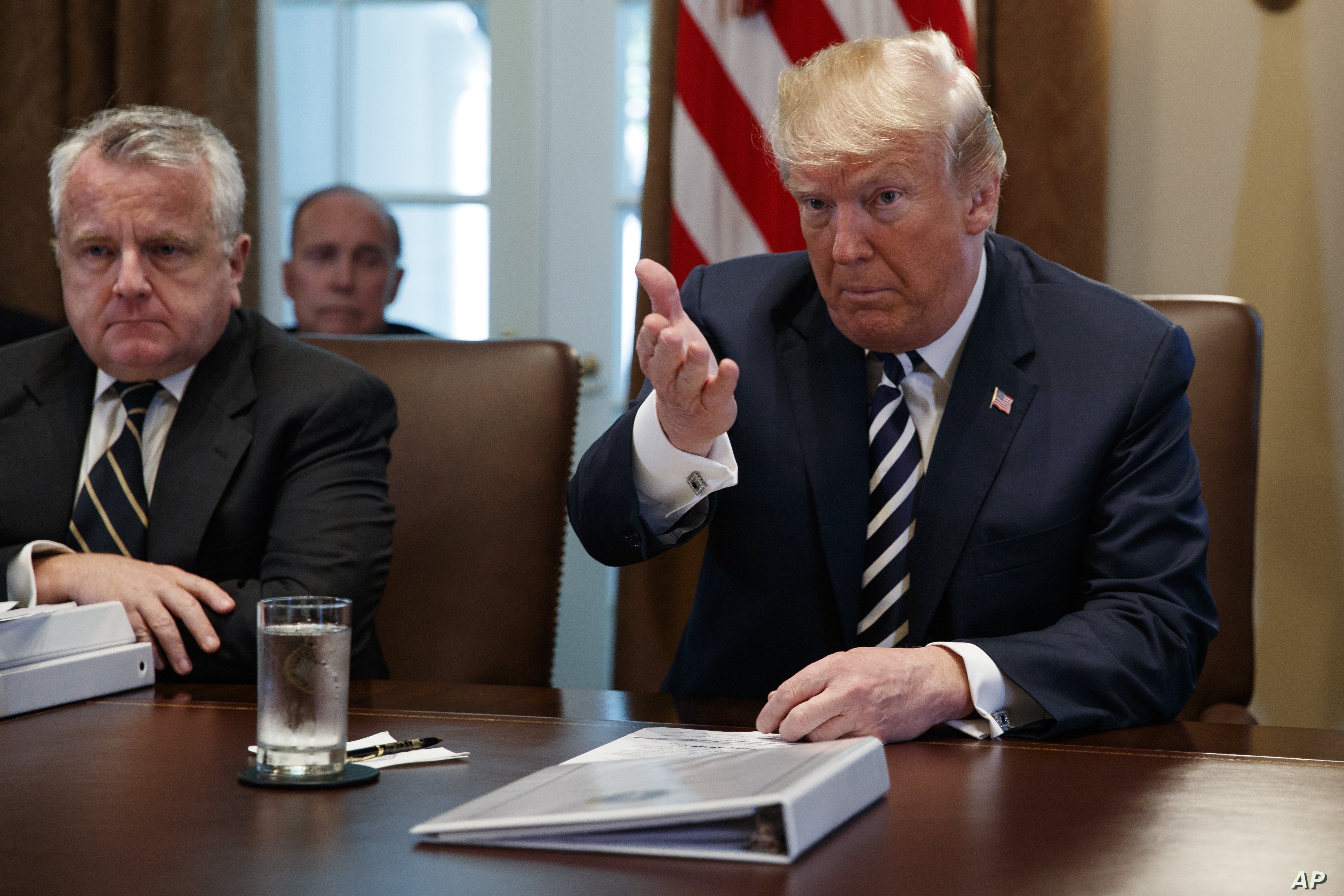 Deputy Secretary of State John Sullivan listens to President Donald Trump speak during a cabinet meeting at the White House, May 9, 2018, in Washington.