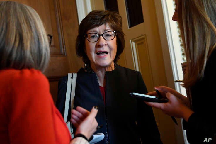 FILE - Sen. Susan Collins, R-Maine, talks to reporters on Capitol Hill in Washington. 