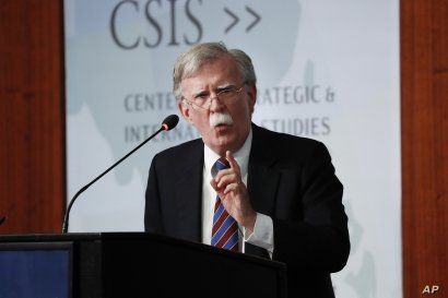 Former National security adviser John Bolton gestures while speaking at the Center for Strategic and International Studies in Washington, Sept. 30, 2019.
