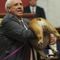 West Virginia Gov. Justice holds up dog during speech, suggests Bette Midler, 'Kiss her heinie'